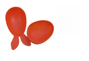 Detail of orange bunny Easter egg with screw-top opening for candy storage gifts