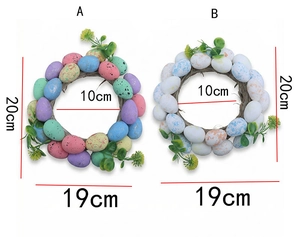 Detail view of Easter wreaths with colorful spotted eggs and green leaves, 20cm outer diameter