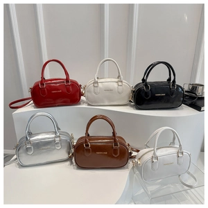 Collection of glossy boston bags in multiple colors featuring fashion text logo