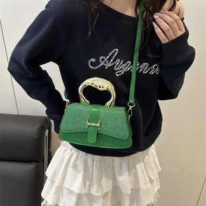 Green leather small square bag with gold curved handle and H-buckle crossbody strap