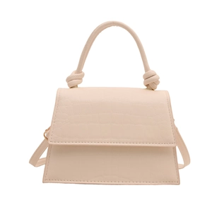 Elegant cream crocodile-embossed trapezoid shoulder bag with stylish knot handle detail