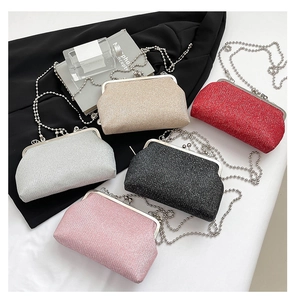 Glittery evening clutch bags in multiple colors with elegant silver metal chain straps