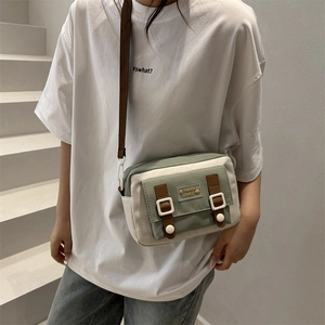 Japanese style sage green canvas crossbody bag for women with rabbit label decoration