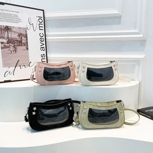 Fashionable underarm Ita bags in four colors with clear PVC windows and star rivets