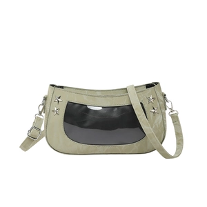 Light green ita shoulder bag with transparent window and silver star studs on faux leather