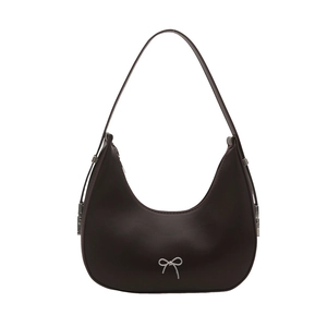 Fashionable dark brown crescent shoulder bag with silver metal bow and adjustable strap