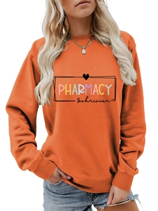 Detail of orange sweatshirt with PHARMACY technician lettering and ribbed cuffs