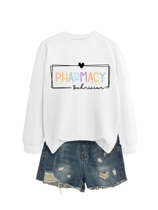 Detail of white crewneck sweatshirt with Pharmacy print and frayed denim shorts