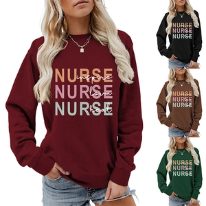Close-up detail of nurse sweatshirt in burgundy black brown and green color options