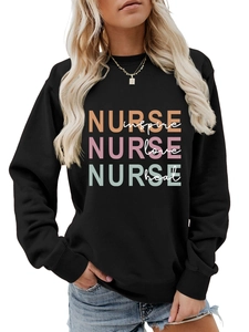 Detail of Nurse inspire love heal print on a black crewneck sweatshirt for women