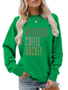 Detail of emerald green sweatshirt with Weekends Coffee Hockey printed text logo
