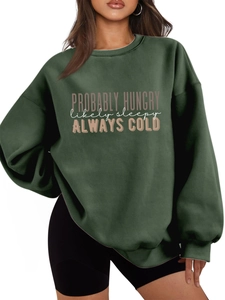 Detail of Probably Hungry print on dark green oversized fleece-lined sweatshirt