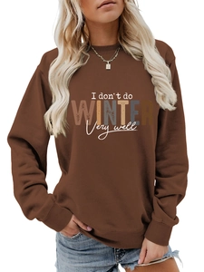 Detail of the crewneck sweatshirt ribbed cuffs and 'I don't do winter' graphic print