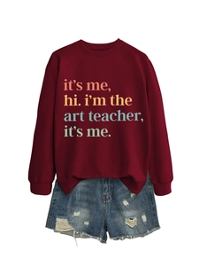 Detail of burgundy sweatshirt with creative art teacher typography print and ribbed neck