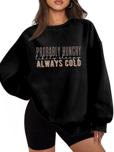 Detail of the printed slogan on the oversized black fleece sweatshirt for women