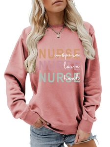 Pink nurse sweatshirt detail with inspire love heal colorful layered printing art