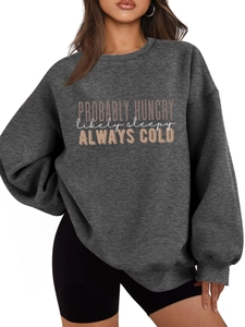 Close-up of dark grey oversized sweatshirt with Probably Hungry slogan embroidery