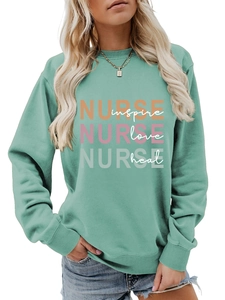 Detail of mint green Nurse sweatshirt showing ribbed collar and high-quality letter print