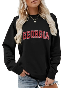 Close-up of black Georgia sweatshirt featuring ribbed cuffs and varsity letter print