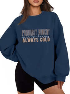 Detail of the navy blue sweatshirt featuring Probably Hungry text and slogans