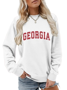 Detail of red Georgia lettering with vintage cracked texture on a white crewneck sweatshirt