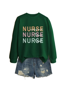 Detail of dark green nurse sweatshirt with inspire love heal print and denim shorts