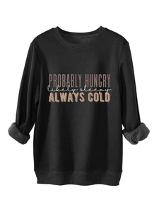 Close-up of black fleece sweatshirt with 'Probably Hungry' slogan and soft grey lining