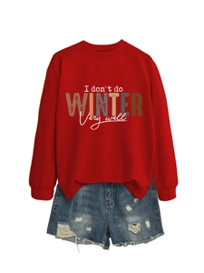 Flat lay of red sweatshirt with I Don't Do Winter text and ripped blue denim shorts
