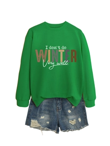 Detail of green crewneck sweatshirt with I don't do winter very well artistic typography