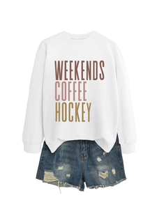 Detail of white crewneck sweatshirt with colorful Weekends Coffee Hockey lettering
