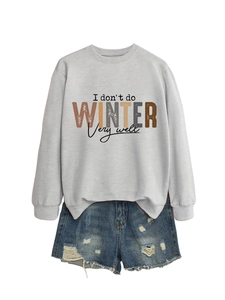 Detail of light gray crewneck sweatshirt with 'I don't do winter very well' slogan print