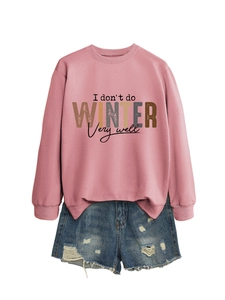 Pink crew neck sweatshirt featuring 'I don't do winter very well' slogan print detail