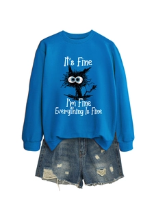 Detail of bright blue sweatshirt with funny cat print and humorous quote on front