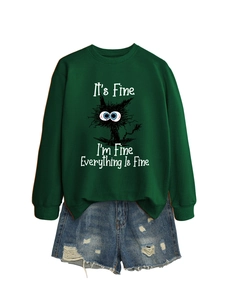 Close-up of crewneck sweatshirt ribbing and artistic cat print with text details