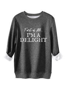 Detail of grey fleece sweatshirt showing thick fabric texture and white slogan print