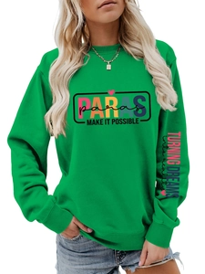 Detail of vibrant green sweatshirt featuring color Paras print and sleeve typography