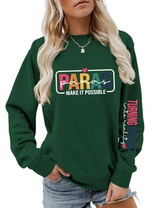 Detail of sleeve print and dark green fabric texture on a trendy oversized sweatshirt