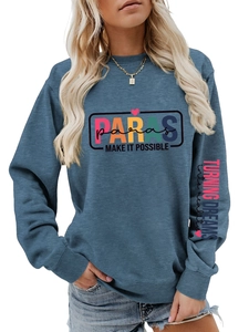 Detail of sleeve print and slogan on navy blue long-sleeve sweatshirt for women