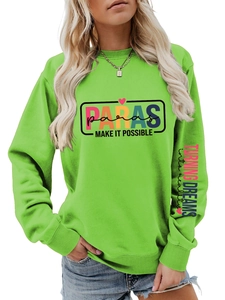 Detail of trendy grass green sweatshirt with colorful chest print and sleeve slogans