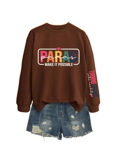 Detail of coffee brown sweatshirt with colorful PARAS chest print and sleeve text