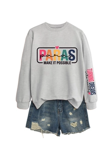 Flat lay of gray long-sleeve sweatshirt with PARAS print and ripped denim shorts