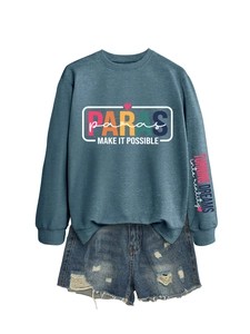 Detail of teal sweatshirt with PARAS print and distressed denim shorts set for women