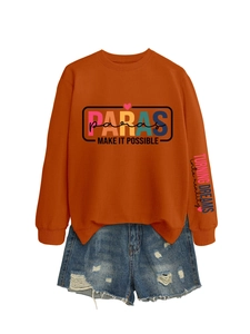 Detail of trendy orange crewneck sweatshirt with colorful arm prints and denim shorts