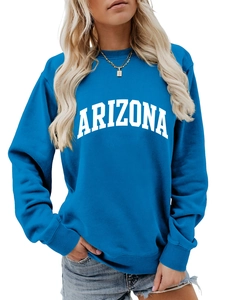 Detail of blue Arizona crewneck sweatshirt with ribbed cuffs and white retro lettering