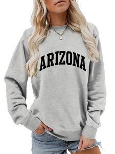Detail of Arizona arch print and crew neckline on a light grey oversized sweatshirt