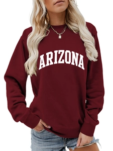 Close-up of the ribbed cuffs and white Arizona lettering on the burgundy sweatshirt
