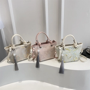 New Chinese style embroidered bucket bag with round handle and tassels in three colors