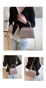 Detail of chevron texture and leather finish on this khaki shell-shaped crossbody bag