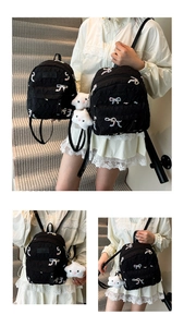Detail of black quilted mini backpack with bow embroidery and plush star charm