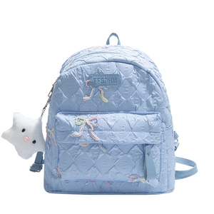 Light blue quilted mini backpack with bow embroidery and star plush pendant charm